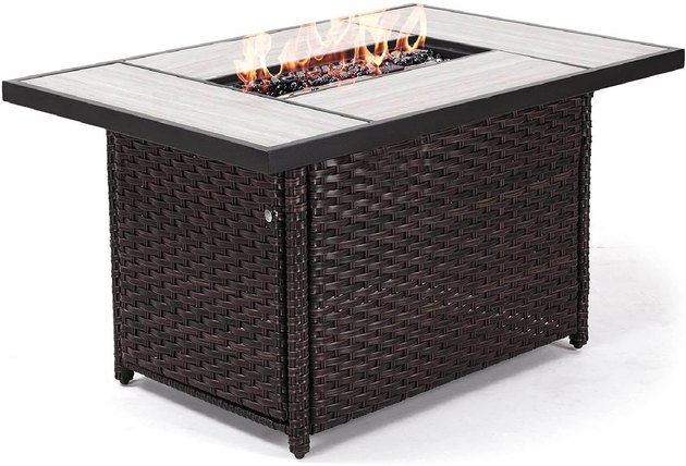 Features: Integrated push-button ignition starts and adjusts flame height easily (AA Battery required), up to 50,000 BTU heat, easy access to interior storage of standard 20 lb propane tank (not included). Can be used as an outdoor dining table or coffee table by simply covering the burner with the included cover when flames are off.