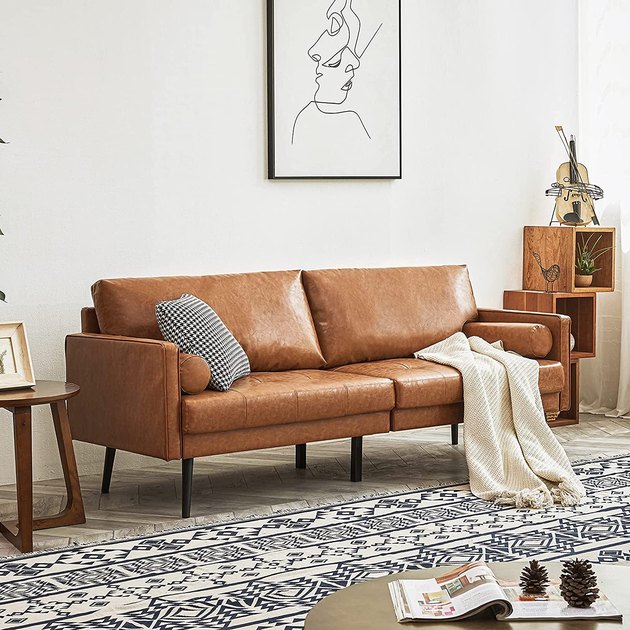 Everything about this sofa is top tier. Its midcentury modern silhouette is timeless with the slightly angled legs and accompanying bolster pillows. Plus, the price point is very impressive.