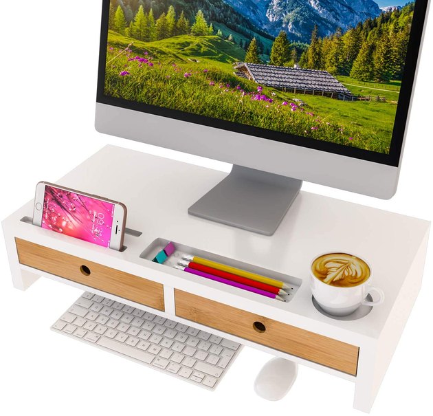 Make your desk a little more ergonomic with this monitor stand riser, that also has drawers and compartments for your office supplies. There’s also extra space under the drawers to tuck away your keyboard and mouse, if needed.