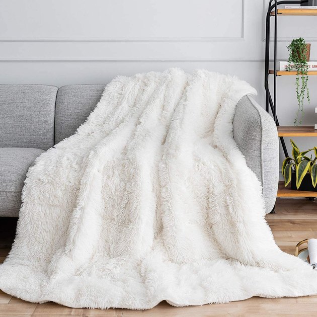 This stylish weighted blanket is an accent piece you'll want to put on display. Whether it's with the faux fur or sherpa side facing up, you can drape the blanket over your sofa or bed for a cozy touch. It comes in multiple colors and in weights from 12 pounds to 20 pounds.