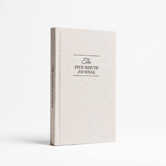 The iconic Five-Minute Journal uses positive psychology to improve happiness one day at a time. Take a few minutes each morning and evening for daily affirmations, gratitude lists, and deep self-reflection. The notebook's simple and beautiful design will look perfect on your desk or bedside table.