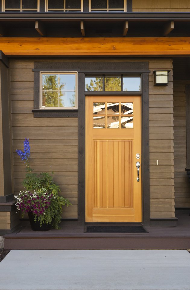 Rustic front door of an upscale home