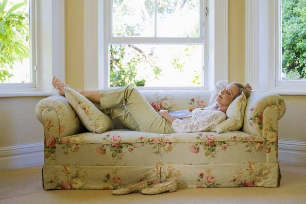 Woman sleeping on sofa