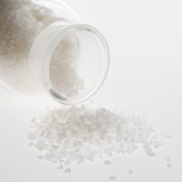 Bath salts spilling from jar