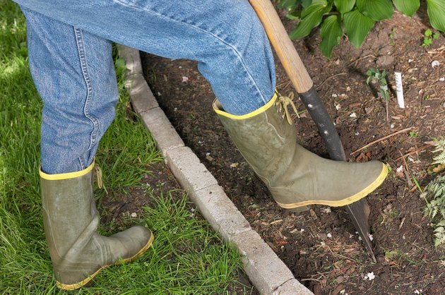 Person digging in a garden