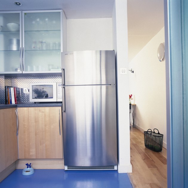 View of a modern kitchen with a steel finish fridge