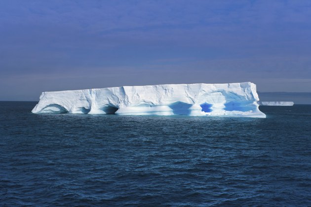 Flat iceberg floating at Antarctic Peninsula