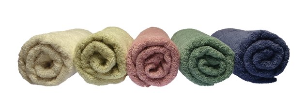 Towels, rolled, arranged in row