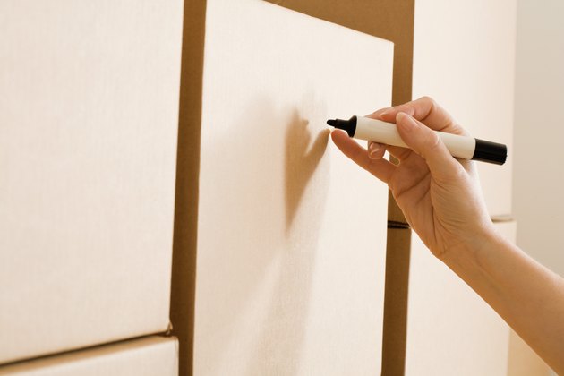 Hand writing on moving boxes