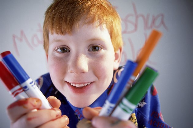 Boy with markers