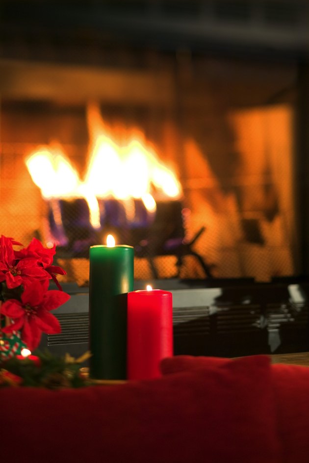 Candles by fireplace