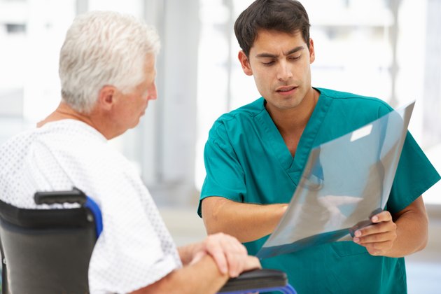 Senior patient with young doctor