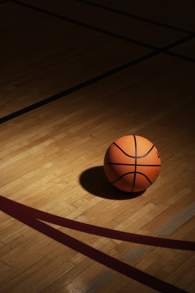 Basketball on basketball court, elevated view