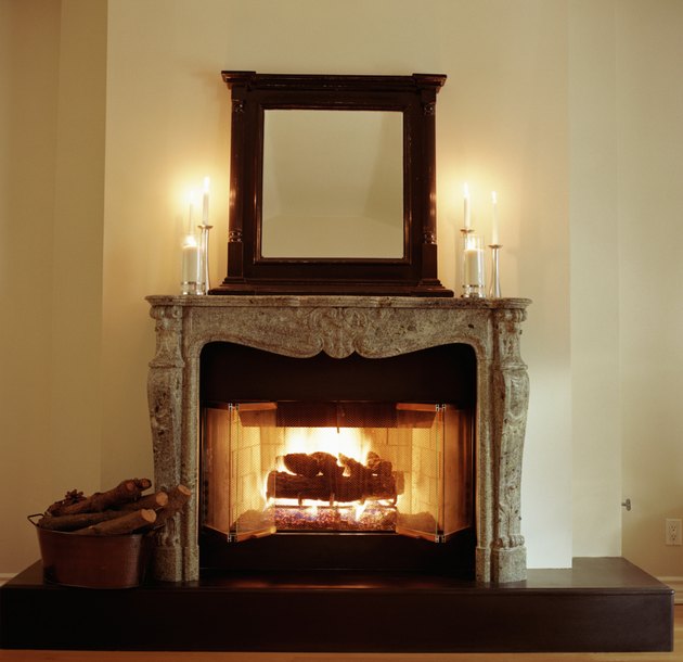 Fireplace with candles on mantle