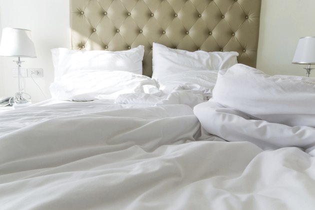 messy bedding sheets and pillow