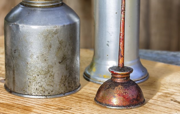 Three Oil Cans