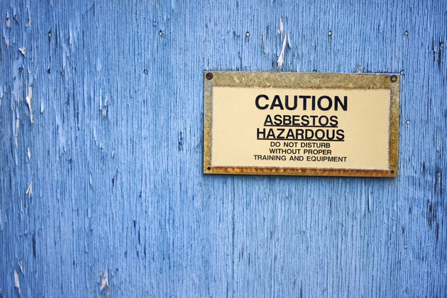 Caution sign warning of asbestos hazard