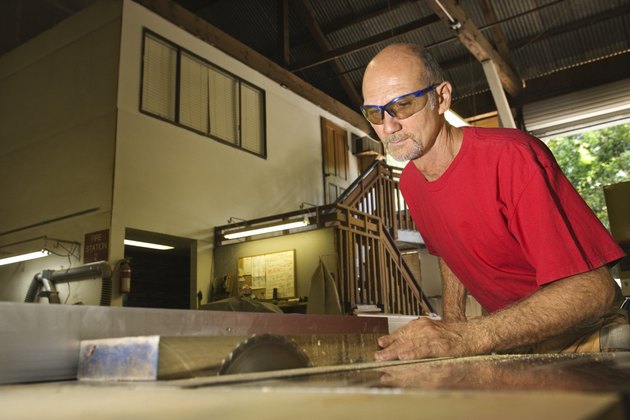 Man cutting wood