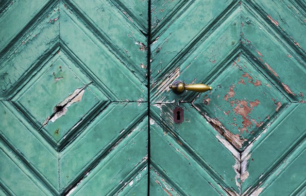 Fragment of old and dilapidated doors