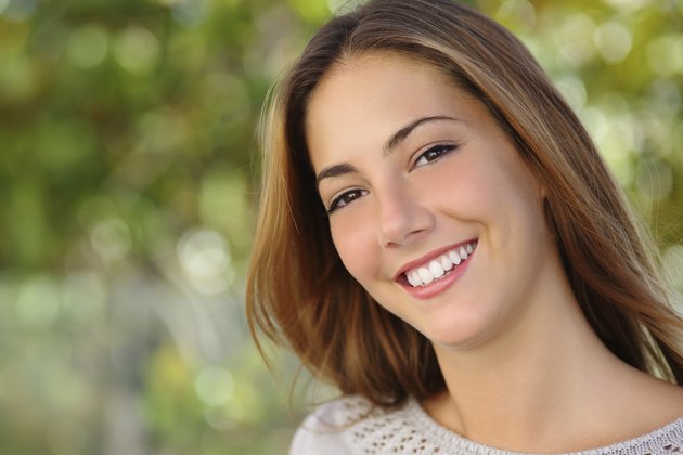 Beautiful white woman smile dental care concept