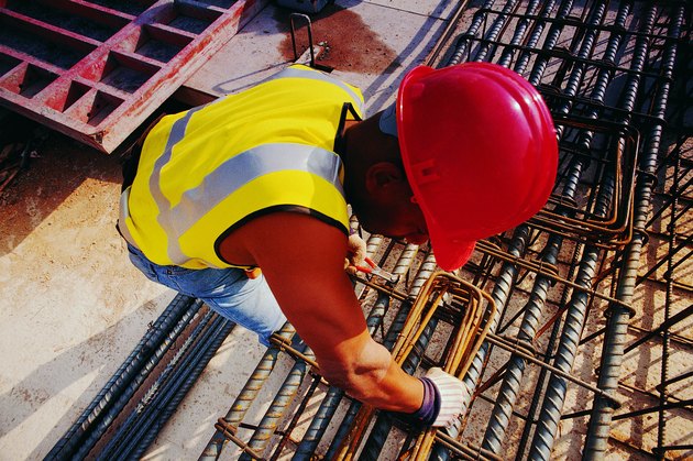 Overhead shot of worker with rods