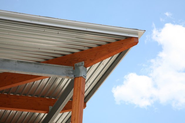Detail of corner of metal roof and wooden support beams