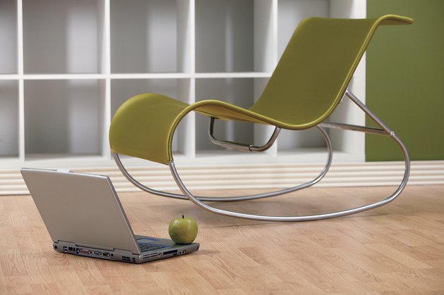Modern Chair with laptop and apple