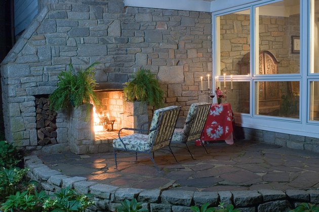 Exterior fireplace on upscale house