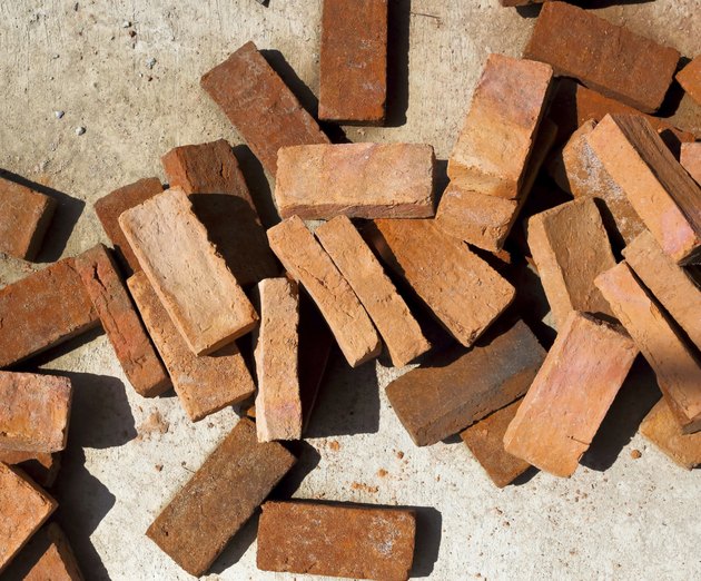 Brick stack on the ground for building.