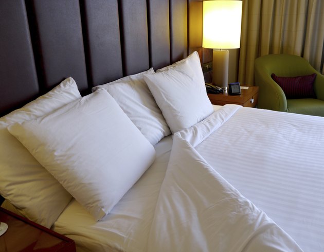 turned down white bed linen
