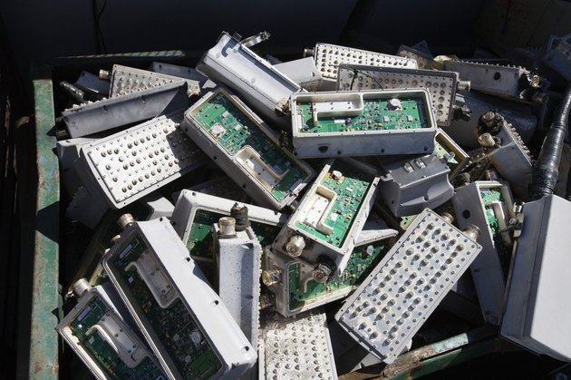 Pile of old electronic components in bin