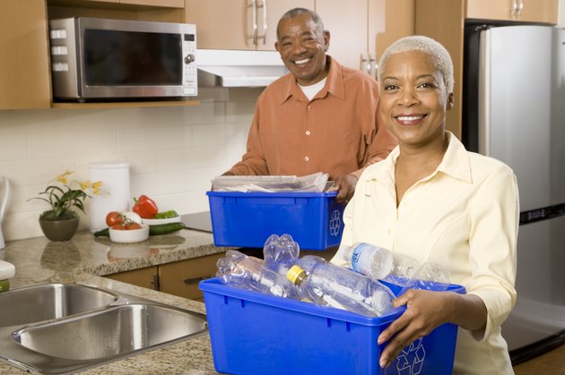 African couple recycling