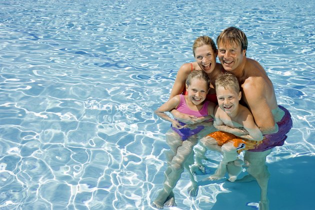 Family in swimming pool