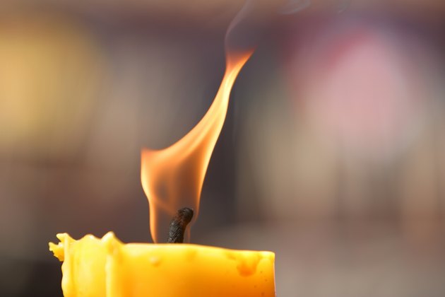 Burning symbolic candle