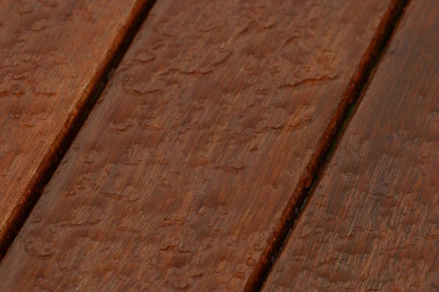 Water on surface of treated wood deck