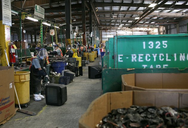 Recycling Center Processes Toxic Components From Old Television Sets