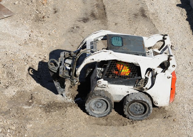 Mini excavator at construction site