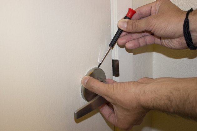 How To Remove Commercial Door Handle : How do you put the handle on the