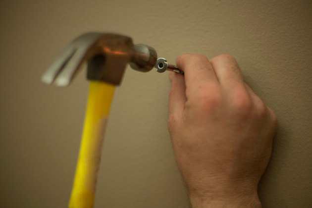 how-to-hang-heavy-things-without-nails-hunker