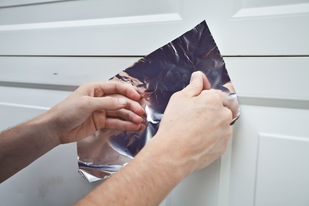 how-to-repair-garage-door-dents-hunker