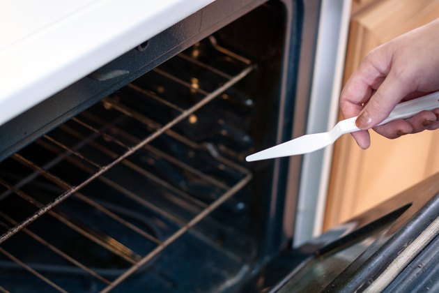 how-to-remove-tin-foil-stuck-to-the-bottom-of-an-oven-hunker