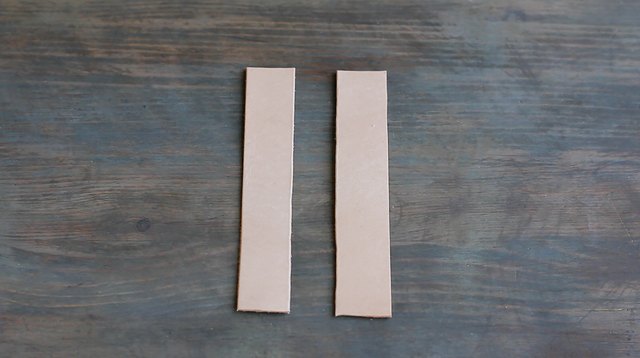 Two strips of tooling leather