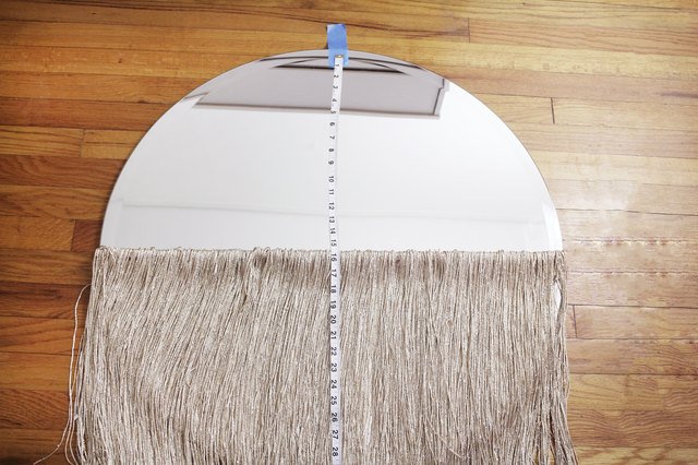 Add Boho Sparkle To Your Space With A Diy Fringed Mirror Hunker Marking Fringe Placement On Mirror