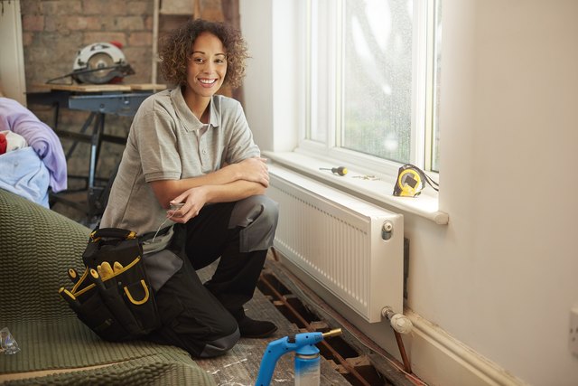 female plumber on site