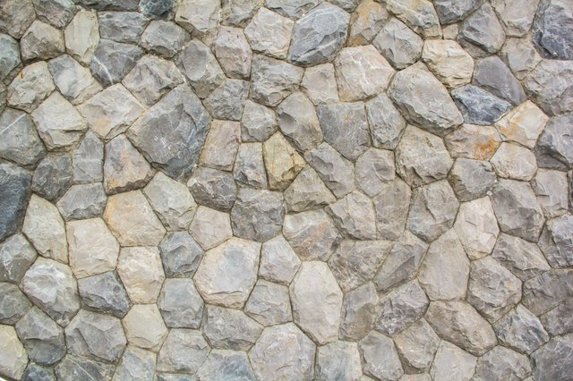 How to Build a Boulder Rock Retaining Wall | Hunker