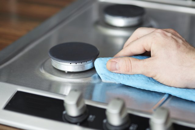 How To Clean Baked On Grease On Stove Grates Hunker