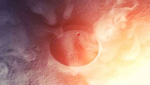 Smoke detector in the smoke of a fire