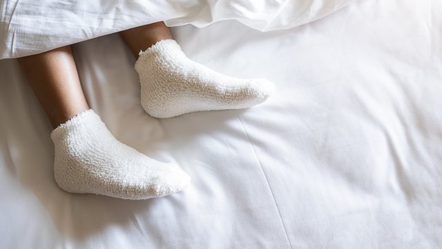 Is Wearing Socks to Bed Weird? We Have Strong Opinions About It | Hunker