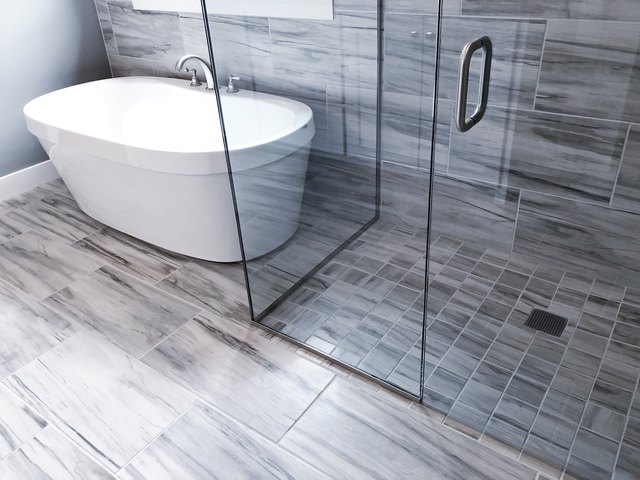 How To Tile A Shower Floor Hunker - How To Install Ceramic Tile Bathroom Shower Floors
