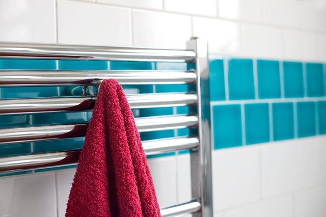 Towel hanging on a rail in bathroom